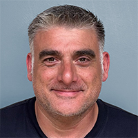 Alberto Lo Re Chauffeur auf dem Kehrichtwagen